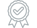 Icône en forme de médaille avec un crochet au centre.