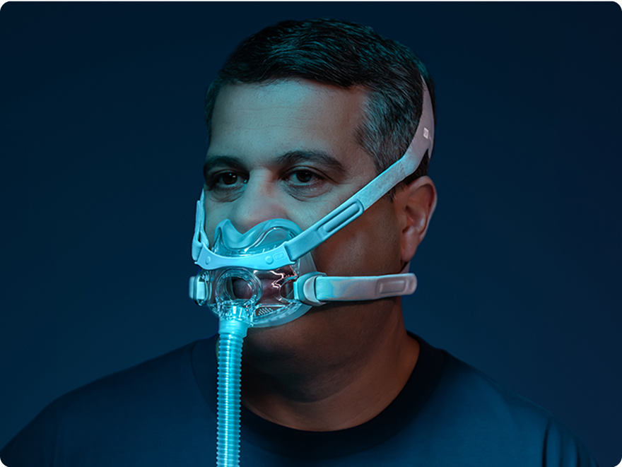 Patient wearing an F&P Evora Full mask