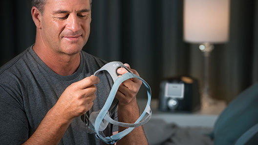 Male fitting his F&P Eson 2 mask